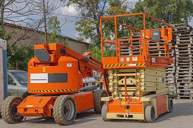 industrial forklift transporting goods in a warehouse in Belleair